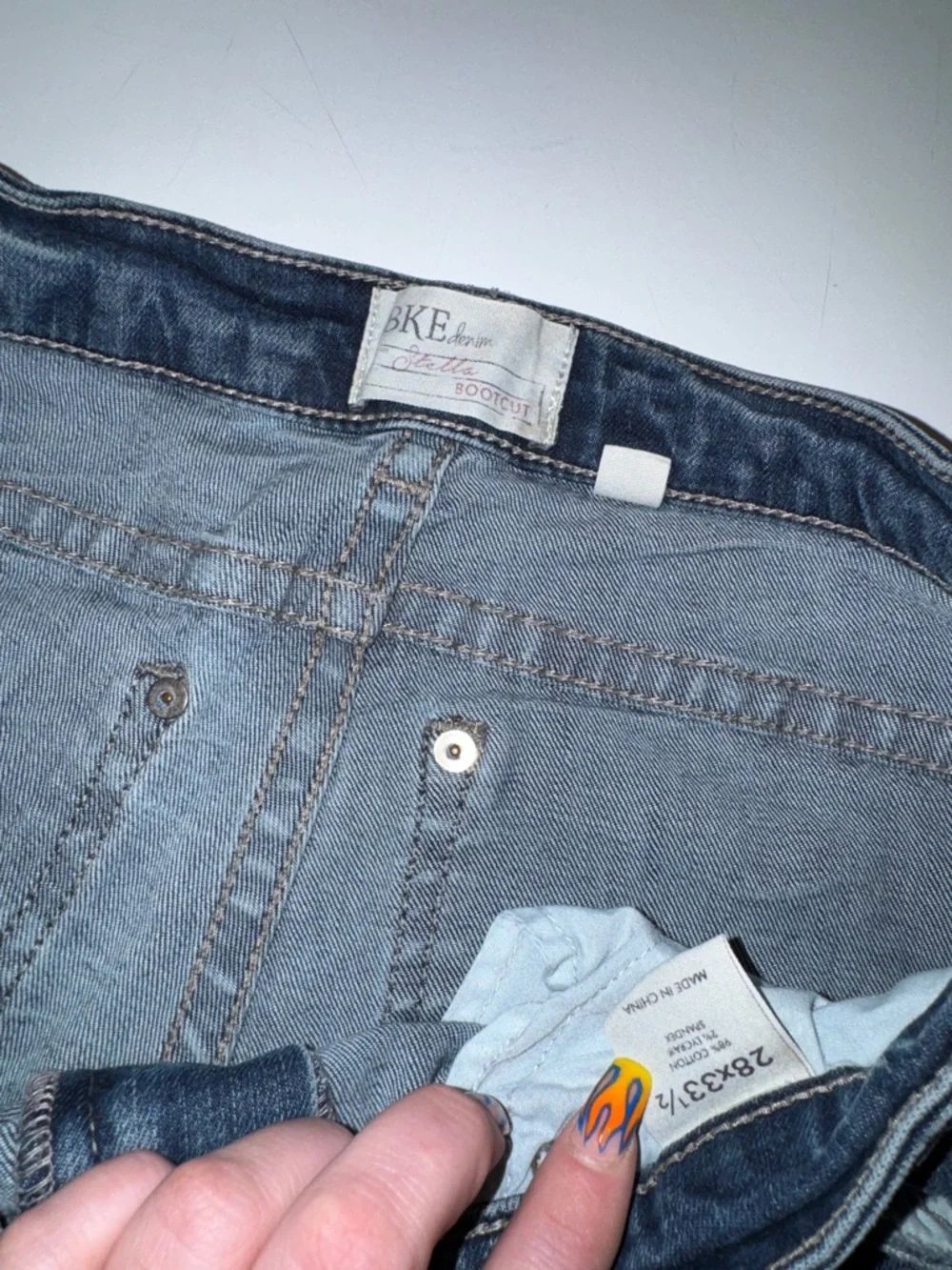 BKE Women’s Stella Boot Cut Jeans - Faded Blue with Distressed‎ Details Size 28L